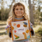 Child holding the Vibrant Veggies box in their hands, to show the box size
