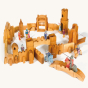 Ostheimer childrens wooden castle set laid out on a beige background