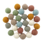 29 handmade Papoose felt earth balls laid out on a white background