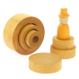 Papoose plastic-free wooden nesting tubes on a white background next to a Grapat Nin and the Papoose stacking discs