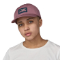 Front view of person with short hair wearing a Patagonia '73 Skyline Trad Cap in a  Evening Mauve colour