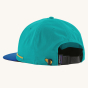 The Patagonia Merganzer Chinstrap Hat - Channel Islands / Subtidal Blue. The back of the hat showing the chin strap toggle, and the adjustable sizer