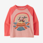 The Patagonia Little Kids Capilene® Cool Daily Crew  - Tortoise Isle graphic, Flamingo Pink X-Dye, has bright pink arms and light pink body Tortoise Island graphic. pictured with white background