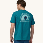 A man models the back of the Patagonia Men's Rubber Tree Mark Responsibili-Tee - Belay Blue on a plain background.