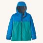 Patagonia Kid's Torrentshell 3 Layer Waterproof Rain Jacket - Vessel Blue. A green and blue waterproof children's jacket with reflective strips on the bottom of the arms, and a patagonia logo on the chest. The jacket also has a grey lining.