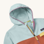 The hood of the Patagonia Kids Micro D Fleece Jacket in light blue, showing the inside and outside of the fleece hood, along with the zip and zipper