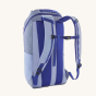 Patagonia Recycled Black Hole Backpack 25L in Pale Periwinkle showing the padded shoulder straps on a cream background