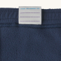 Patagonia Kids Micro-D Fleece Joggers - New Navy on a plain background. View of the name tag on the inside of the joggers.
