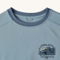 A close up of the collar showing the stitching and loop to hang up the t-shirt. The t-shirt in the image is greay/blue