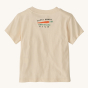 Patagonia Little Kids Graphic T-Shirt - Farm Snacks / Undyed Natural. A cream coloured t-shirt with a fun "Dirty Hands - Gardening Club" text with an image of a carrot