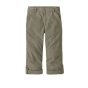 Patagonia kids durable hike pants in garden green with the legs rolled up on a white background