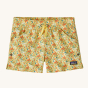 Patagonia Kids Costa Rica Baggies Shorts - Little Isla / Milled Yellow. These shorts are yellow with a small flowery print pattern, and have a drawstring tie around the waste , and a Patagonia logo on the bottom of the short leg