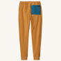 Patagonia Kids Micro-D Fleece Joggers - Dried Mango. Back view of the joggers on a plain background.