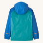 The back of a Patagonia Kid's Torrentshell 3 Layer Waterproof Rain Jacket - Vessel Blue which shows the hood and the reflective strips near the arm cuffs