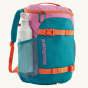 Patagonia Kids Refugito Day Pack Backpack 18L. Front three-quarter view of the backpack with a water bottle in the side pocket.