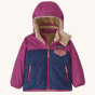 Patagonia Little Kids Reversible Tribbles Hoody - Sound Blue on a plain background. 