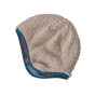 Reverse side of the Patagonia little kids fluffy reversible beanie in the wavy blue colour on a white background