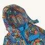 Close up of the hood on the Patagonia little kids patterned rain jacket on a beige background