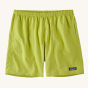 Patagonia Men's Baggies Beach Shorts - Phosphorus Green. Lightweight, multifunctional 100% recycled nylon Patagonia Baggies™ Shorts with a loose cut and longer leg, on a cream background