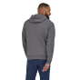 Man stood backwards wearing the Patagonia recycled line logo uprisal hoody on a white background