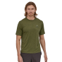 Man stood on a white background wearing the Palo Green Patagonia capilene technical t-shirt 