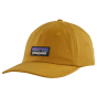 Picture of the gold trad cap (front view). Picture background is white.