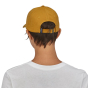 Picture of model wearing the trad cap showing the hat from the back. Picture background is white.