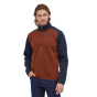 Man wearing the eco-friendly Patagonia better sweater fleece on a white background