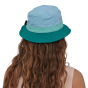 person wearing a blue coloured Patagonia Wavefarer Bucket Hat shown from the back 