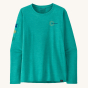 Patagonia Women's Long-Sleeved Capilene Cool Daily Graphic Shirt - Channel Islands / Subtidal Blue X-Dye, with navy blue Patagonia writing and a yellow embroidered sun, with a bird, sun and plant print on the side of one of the sleeves