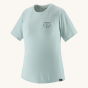 Patagonia Women's Capilene Cool Trail Graphic Shirt - Forge Mark Crest / Wispy Green, with a black Patagonia Built to Endure logo on the front of the top