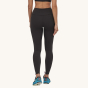 Patagonia Women's Maipo 7/8 Sports Leggings - Black. A woman models the leggings facing away from the camera on a plain background.