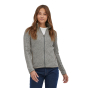 Close up of woman stood on a white background wearing the Patagonia Birch White thermal Better Sweater Jacket