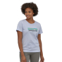 Woman stood in the Patagonia recycled pastel p6 logo t shirt on a white background