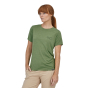 Woman stood on a white background wearing the Patagonia organic cotton cap cool daily t-shirt in the sedge green colour