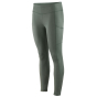 Patagonia Women's Pack Out Tights in a Hemlock Green colour pictured on a plain white background