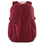 Picture of Patagonia Refugio backpack in red. Background of the picture is white.