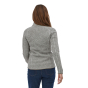 Woman facing backwards wearing the Patagonia Birch White Better Sweater fleece