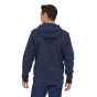 Man stood backwards on a white background wearing the Patagonia eco-friendly organic cotton p-6 logo hoody in the navy colour