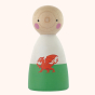 Peepul plastic-free wooden Welsh Dragon peg doll toy on a beige background