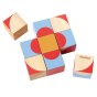 PlanToys kids solid wooden geo pattern cubes laid out in a flower shape on a white background