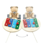 2 PlanToys musical xylophone bear toys on a white background showing how the bear plays different notes when you steer