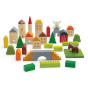 PlanToys eco-friendly wooden countryside toy blocks set up in a small farm scene on a white background