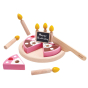 The PlanToys wooden birthday cake includes 6 slices of double sided cake, 6 removable candles, knife, plate and mini chalk board. White background.