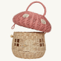 Olli Ella Mushroom Rattan basket with a spotted pink mushroom cap, a door, and windows. The mushroom cap acts as a lid, and is open.