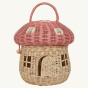 Olli Ella Mushroom Rattan basket with a spotted pink mushroom cap, a door, and windows. The door is ajar. 