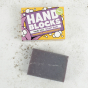 Hand Blocks purple Mango and Passionfruit soap bar and box on a white speckled back ground