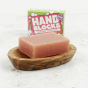 Shower Blocks, Hand Blocks Soap Bar and Box in Mint and Grapefruit with the soap in a wooden soap dish in the foreground