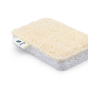 Close up of a Seep natural cellulose and loofah scourer on a white background