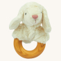 Senger Animal Grasping and Teething toy - Sheep. A smooth, cherry wood ring with a soft plush head of a cuddly sheep attached which is made of 100% organic cotton and stuffed with sheep wool. On a cream background